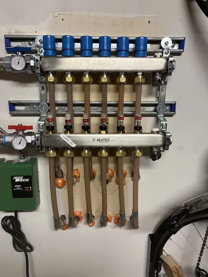 Plumber performing Leak Detection at a residential property in Cohoes